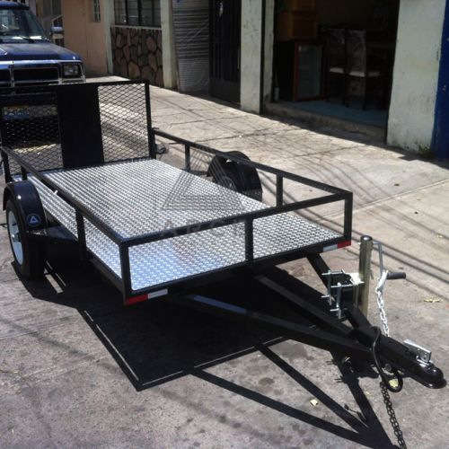 Remolque tipo plataforma con piso de aluminio rampa con protección central para ideal para transportar una moto